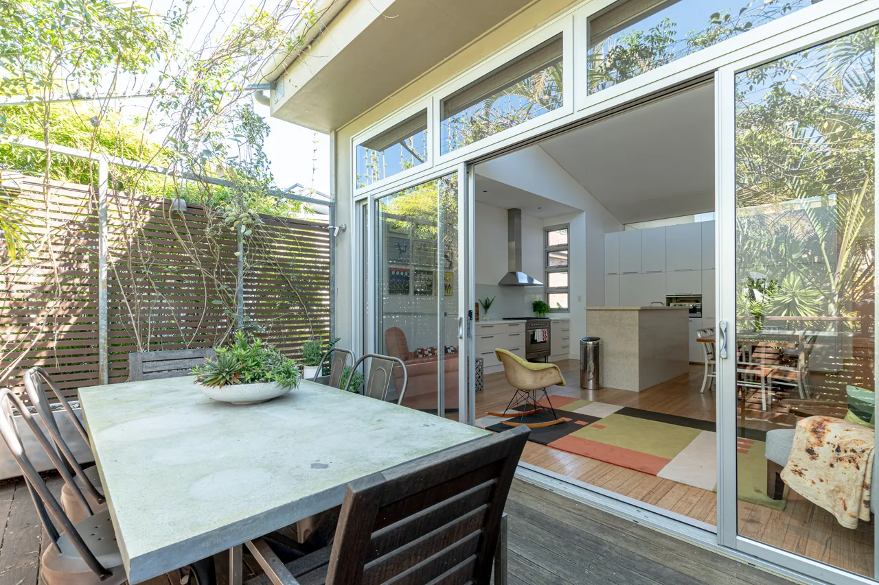 Outdoor dining terrace connected to the living space